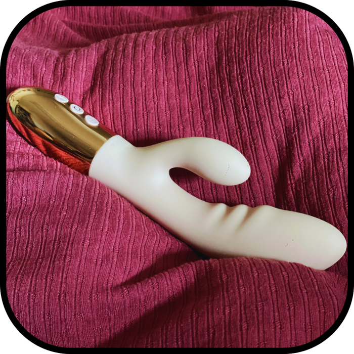 Le Wand Blend bendable neck close-up showing internal G-spot shaft and external rabbit stimulator